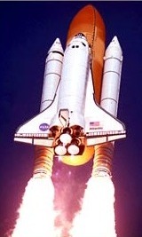NASA photo of a space shuttle flying upward
